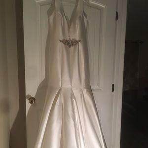 Dress size 10. Front decal can be removed